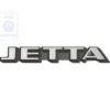 Emblème JETTA chromé sur fond noir satiné pour face arrière de VW Jetta 2 phase 1 (-07/1987) - sans niveau de finition