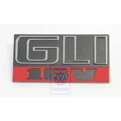 Sigle GLI 16V chromé noir et rouge de calandre 7 barrettes pour VW Jetta 2 GLI 16V phase 1 (02/1986-07/1987)